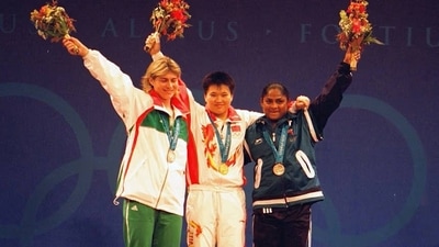 Karnam Malleswari made history at Sydney 2000 by winning a bronze in weightlifting and becoming the first Indian woman to win an Olympic medal. Malleswari competed in the women's 69kg category and managed to lift a best weight of 110.0kg in snatch and 130.0kg in clean and jerk. She thus finished with a total of 240.0kg, putting herself well clear of fourth spot. (Getty Images ) Karnam Malleswari made history at Sydney 2000 by winning a bronze in weightlifting and becoming the first Indian woman to win an Olympic medal. Malleswari competed in the women's 69kg category and managed to lift a best weight of 110.0kg in snatch and 130.0kg in clean and jerk. She thus finished with a total of 240.0kg, putting herself well clear of fourth spot. (Getty Images )