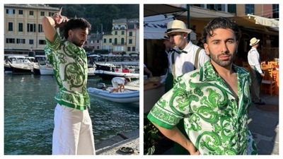 Orhan Awatramani, a.k.a. Orry, the Gen Z icon, is looking fabulous in this casual fit. The green top with a whimsical swirling pattern and airy white pants create a perfect vacay look. Orhan Awatramani, a.k.a. Orry, the Gen Z icon, is looking fabulous in this casual fit. The green top with a whimsical swirling pattern and airy white pants create a perfect vacay look.