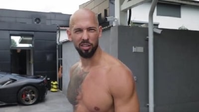 Tate, 37, boasted that he intends to get in a sports car and travel the world to meet his "bi****". (X) Tate, 37, boasted that he intends to get in a sports car and travel the world to meet his "bi****". (X)