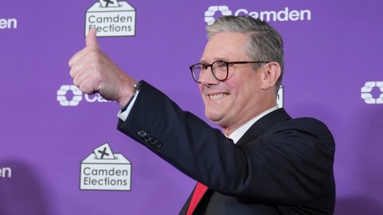 Britain's Labour Party leader Keir Starmer gives a thumbs up to his supporters after he was elected for the Holborn and St Pancras constituency, in London, Friday, July 5, 2024.