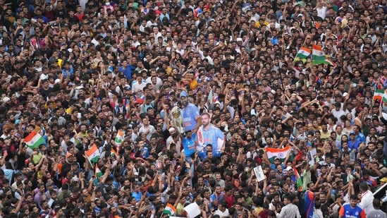 Fans wait for the arrival of Indian cricket team members for a victory parade to celebrate winning the ICC men's T20 World Cup, along the Marine Drive in Mumbai, India(REUTERS)