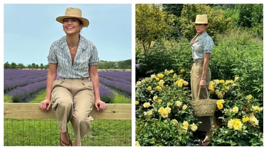 Jennifer Lopez radiates countryside charm in a striped blue and white shirt, beige pants, and a chic hat. She paired the outfit with casual slippers, perfect for a leisurely stroll among meadows and flowers.