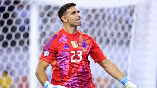 Emiliano Martinez of Argentina saves the first penalty from Angel Mena of Ecuador in the penalty shoot out during the CONMEBOL Copa America 2024 quarter-final match between Argentina and Ecuador(Getty Images via AFP)