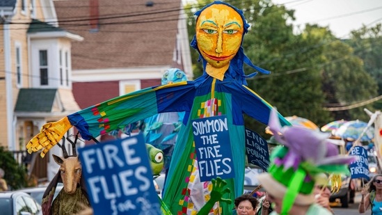Costumed revellers march through the streets during the Fishtown Horribles Parade, ahead of Independence Day, in Gloucester, Massachusetts, on July 3, 2024. The parade is part of the city's July 4th celebrations. (Photo by &nbsp;/ AFP)(AFP/Joseph Prezioso)