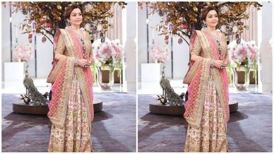 Nita Ambani got decked up in custom made ivory lehenga by Manish Malhota. Her outfit features vintage multi hued traditional zardosi embroidery, woven banarsi tissue dupatta with hand embroidered timeless intricate zari borders and a matching blouse.(Instagram)