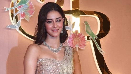 Ananya Pandey rocked a stunning shimmery saree for the party with a diamond necklace.