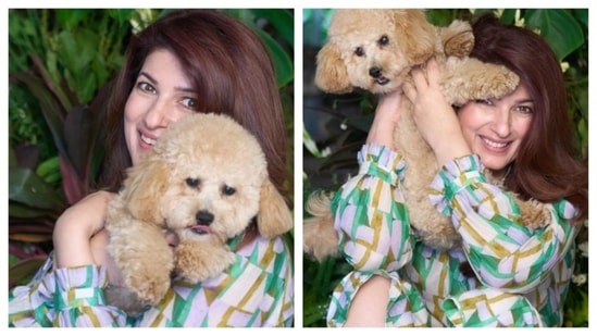 Twinkle Khanna is serving major pet-mom goals as she poses with her pet dog, Mr. Jeeves. Her breezy green and golden patterned dress is perfect for a day out and to relax with family, friends, and pets