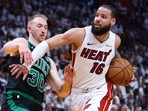 MIAMI, FLORIDA - APRIL 27: Caleb Martin #16 of the Miami Heat drives against Sam Hauser #30 of the Boston Celtics during the third quarter in game three of the Eastern Conference First Round Playoffs at Kaseya Center on April 27, 2024 in Miami, Florida. MIAMI, FLORIDA - APRIL 27: Caleb Martin #16 of the Miami Heat drives against Sam Hauser #30 of the Boston Celtics during the third quarter in game three of the Eastern Conference First Round Playoffs at Kaseya Center on April 27, 2024 in Miami, Florida.