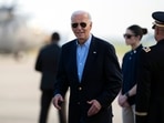 President Joe Biden responds to questions from the traveling press as he arrives at Delaware Air National Guard Base in New Castle, Del., Friday, July 5, 2024, from a campaign rally in Madison, Wis. (AP Photo/Manuel Balce Ceneta)