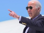 President Joe Biden points as he arrives on Air Force One at Dane County Regional Airport to attend a campaign rally in Madison, Wis., Friday, July 5, 2024. (AP Photo/Manuel Balce Ceneta)