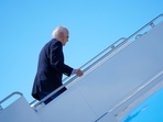 President Joe Biden boards Air Force One to depart at Dane County Regional Airport in Madison, Wis., following a campaign visit, Friday, July 5, 2024. (AP Photo/Manuel Balce Ceneta)