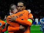Netherlands players celebrate their win.
