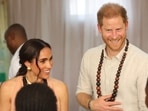 Britain's Meghan (L), Duchess of Sussex, and Britain's Prince Harry (C), Duke of Sussex, speak with students at the Lightway Academy in Abuja on May 10, 2024 as they visit Nigeria as part of celebrations of Invictus Games anniversary. (Photo by Kola Sulaimon / AFP) Britain's Meghan (L), Duchess of Sussex, and Britain's Prince Harry (C), Duke of Sussex, speak with students at the Lightway Academy in Abuja on May 10, 2024 as they visit Nigeria as part of celebrations of Invictus Games anniversary. (Photo by Kola Sulaimon / AFP)