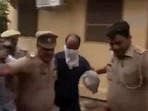 Hathras police arrested Dev Prakash Madhukar on Friday.