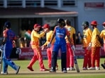 Zimbabwe players celebrate a wicket.(AP) Zimbabwe players celebrate a wicket.(AP)