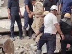 Rescue operations are underway to evacuate trapped residents after a multi storeyed building collapsed in Surat. 