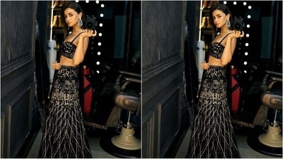 Her stunning custom-made ethnic ensemble is from the shelves of the brand Faraz Manan. It comes in an enchanting shade of black adorned with intricate silver sequin detailing. (Instagram/@aliaabhatt) Her stunning custom-made ethnic ensemble is from the shelves of the brand Faraz Manan. It comes in an enchanting shade of black adorned with intricate silver sequin detailing. (Instagram/@aliaabhatt)