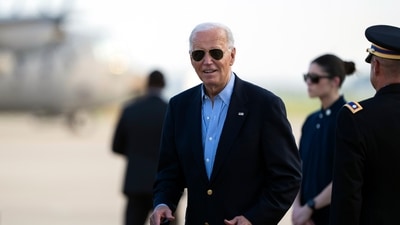 President Joe Biden responds to questions from the traveling press as he arrives at Delaware Air National Guard Base in New Castle, Del., Friday, July 5, 2024, from a campaign rally in Madison, Wis. (AP Photo/Manuel Balce Ceneta) (AP) President Joe Biden responds to questions from the traveling press as he arrives at Delaware Air National Guard Base in New Castle, Del., Friday, July 5, 2024, from a campaign rally in Madison, Wis. (AP Photo/Manuel Balce Ceneta) (AP)