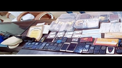 Items recovered from the arrested cyber thugs in Bulandshahr. (Sourced) Items recovered from the arrested cyber thugs in Bulandshahr. (Sourced)