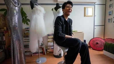 Having fled Myanmar for Japan with his parents as a child, Shibuya Zarny began his fashion career as a model in Tokyo and went on to make clothes for royalty. (Photo by Kazuhiro NOGI / AFP) Having fled Myanmar for Japan with his parents as a child, Shibuya Zarny began his fashion career as a model in Tokyo and went on to make clothes for royalty. (Photo by Kazuhiro NOGI / AFP)