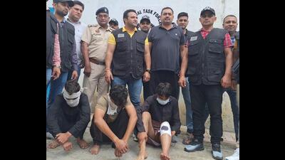The three accused in the murder of an ASI in Karnal in STF custody on Saturday. (HT Photo) The three accused in the murder of an ASI in Karnal in STF custody on Saturday. (HT Photo)
