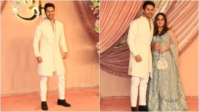 New parents Varun Dhawan and Natasha Dalal attended Anant Ambani and Radhika Merchant's sangeet ceremony. Varun looked dapper in an embroidered bandhgala jacket and white pants, while Natasha complemented him in an ice-blue lehenga set. (HT Photo/Varinder Chawla) New parents Varun Dhawan and Natasha Dalal attended Anant Ambani and Radhika Merchant's sangeet ceremony. Varun looked dapper in an embroidered bandhgala jacket and white pants, while Natasha complemented him in an ice-blue lehenga set. (HT Photo/Varinder Chawla)