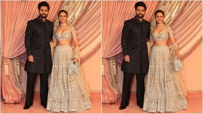 Rakul Preet Singh attended Anant Ambani and Radhika Merchant's sangeet with her husband, Jackky Bhagnani. While Rakul wore a lehenga set to the event, Jackky chose a black sherwani. Rakul styled the ensemble with a choker necklace, embroidered potli bag, and minimal glam. (HT Photo/Varinder Chawla) Rakul Preet Singh attended Anant Ambani and Radhika Merchant's sangeet with her husband, Jackky Bhagnani. While Rakul wore a lehenga set to the event, Jackky chose a black sherwani. Rakul styled the ensemble with a choker necklace, embroidered potli bag, and minimal glam. (HT Photo/Varinder Chawla)