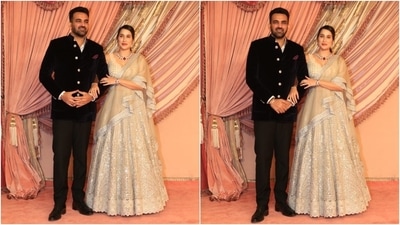 Sagarika Ghatge and Zaheer Khan attended Anant Ambani and Radhika Merchant's sangeet. Zaheer wore a black bandhgala jacket, white shirt, and black tapered pants, while Sagarika chose a beige sequin-embroidered lehenga set. She styled the ensemble with ruby and diamond jewels and minimal glam. (HT Photo/Varinder Chawla) Sagarika Ghatge and Zaheer Khan attended Anant Ambani and Radhika Merchant's sangeet. Zaheer wore a black bandhgala jacket, white shirt, and black tapered pants, while Sagarika chose a beige sequin-embroidered lehenga set. She styled the ensemble with ruby and diamond jewels and minimal glam. (HT Photo/Varinder Chawla)