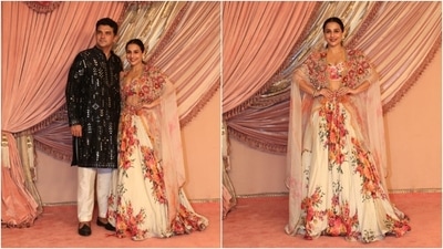 Vidya Balan attended Anant Ambani and Radhika Merchant's sangeet ceremony with her husband, Siddharth Roy Kapur. Vidya embraced floral in a gorgeous deep-neck blouse, flared lehenga skirt, and a cape-styled jacket draped like a dupatta. Meanwhile, Siddharth wore a sequinned kurta and white silk pants. (HT Photo/Varinder Chawla) Vidya Balan attended Anant Ambani and Radhika Merchant's sangeet ceremony with her husband, Siddharth Roy Kapur. Vidya embraced floral in a gorgeous deep-neck blouse, flared lehenga skirt, and a cape-styled jacket draped like a dupatta. Meanwhile, Siddharth wore a sequinned kurta and white silk pants. (HT Photo/Varinder Chawla)