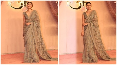 Athiya Shetty exudes sartorial elegance in a beautifully cream-hued saree adorned with floral embellishments and lace borders. She paired it with a V-neck blouse, statement earrings, kohl-rimmed eyes, and red lips, completing her head-turning look. (HT photo/VarinderChawla) Athiya Shetty exudes sartorial elegance in a beautifully cream-hued saree adorned with floral embellishments and lace borders. She paired it with a V-neck blouse, statement earrings, kohl-rimmed eyes, and red lips, completing her head-turning look. (HT photo/VarinderChawla)