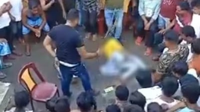 Kangaroo court: Tajmul Islam flogging a couple for an apparent extra-marital relationship Kangaroo court: Tajmul Islam flogging a couple for an apparent extra-marital relationship