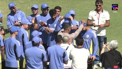 Riyan Parag's father, Parag Das, presented him with the India cap before the first T20I against Zimbabwe Riyan Parag's father, Parag Das, presented him with the India cap before the first T20I against Zimbabwe