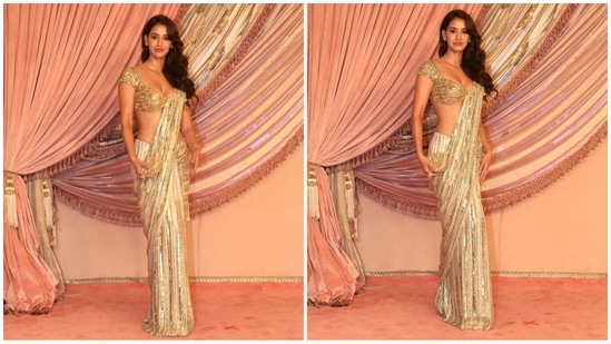 Disha Patani dazzled in a gold saree adorned with sequin detailing, radiating glamour. She complemented the look with a matching sweetheart neckline blouse, leaving fans in awe with her stunning appearance.(HT photo/VarinderChawla)