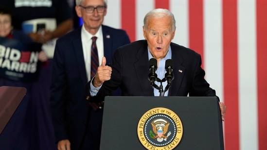 President Joe Biden speaks at a campaign rally at Sherman Middle School in Madison, Wis., Friday, July 5, 2024, as Wisconsin Gov. Tony Evers watches. 