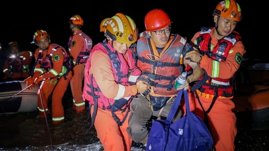 Around 5,700 residents were relocated after waters breached a dike at China's second-largest freshwater lake in the south of the country, while rescue workers rushed to contain further damage from outflows, Chinese state media said on Saturday.