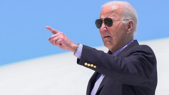 President Joe Biden points as he arrives on Air Force One at Dane County Regional Airport to attend a campaign rally in Madison, Wis., Friday, July 5, 2024. (AP Photo/Manuel Balce Ceneta)(AP)