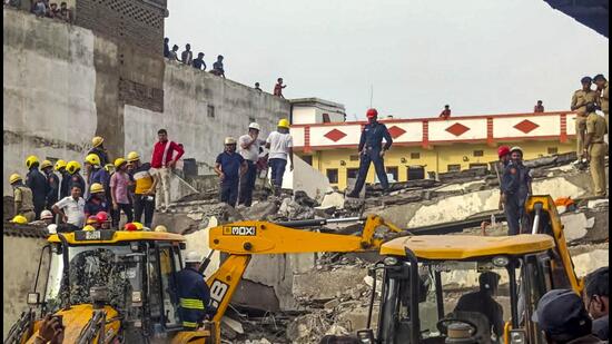 Fire officials, along with NDRF and SDRF teams, rushed to the site and began working to clear the debris and rescue those trapped. (PTI)