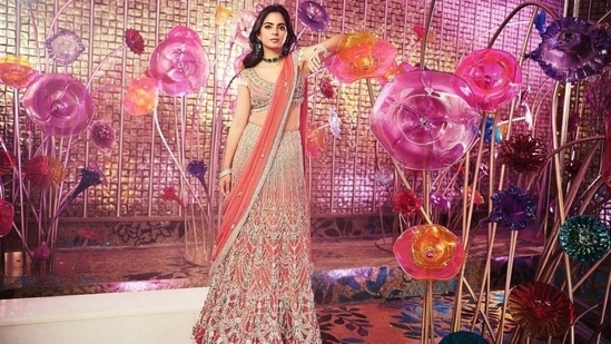 The last look Isha chose for her brother's sangeet ceremony was a Flaguni Shane Peacock lehenga. The pink lehenga set features a bralette, an A-line lehenga skirt, and a matching dupatta. The ensemble comes decked in shimmering white and emerald green crystals, pearl tassels, and sequin embroidery. (Instagram)