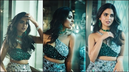 Isha styled the ensemble with emerald and diamond jewels, including earrings, a choker necklace, rings, and a bracelet. Lastly, she opted for darkened brows, mascara on the lashes, smoky eyes, brown lip shade, rouge on the cheeks, and a contoured face for the makeup. (Instagram)