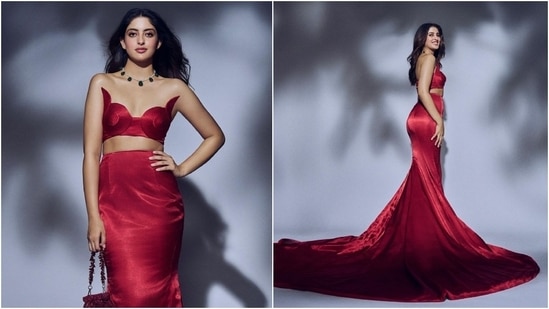 Navya Nanda's custom Anu Jani Sandeep Khosla strapless bralette styled with a skirt featuring a massive train and a matching stroll stole the spotlight at Anant and Radhika's sangeet. She wore the unique ensemble with emerald jewels and a potli bag.&nbsp;(Instagram)