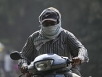 A person commutes in Delhi covering his face amid air pollution in November 2023. (File Photo)(HT Photo) A person commutes in Delhi covering his face amid air pollution in November 2023. (File Photo)(HT Photo)