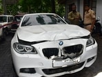 Worli hit and run case BMW car standing at premises of worli police station and police official inspecting car at parking stand of worli police station, at Worli, in Mumbai, India, on Sunday, July 07, 2024. (Photo by Bhushan Koyande/HT Photo)