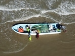 A drone view shows fishermen as tropical storm Beryl continues to move through the Gulf of Mexico, in Playa Bagdad, Mexico July 6, 2024. REUTERS/Daniel Becerril