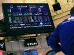 Stock market numbers are displayed on a screen at the New York Stock Exchange in New York City (Michael M. Santiago / Getty Images via AFP) Stock market numbers are displayed on a screen at the New York Stock Exchange in New York City (Michael M. Santiago / Getty Images via AFP)