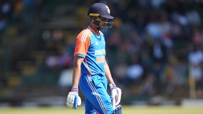 Indian captain Shubman Gill walks off the pitch after he was dismissed on just 2 in the second T20I between Zimbabwe and India at Harare Sports Club. (AP)