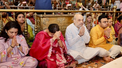 Union home minister Amit Shah with his family participates in the 'Mangala Aarti' of Sri Jagannath Mandir on the occasion of Lord Jagannath's Rath Yatra in Ahmedabad. (PTI) Union home minister Amit Shah with his family participates in the 'Mangala Aarti' of Sri Jagannath Mandir on the occasion of Lord Jagannath's Rath Yatra in Ahmedabad. (PTI)