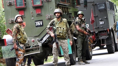 Army personnel stand guard at the encounter site where a jawan was killed in a gunfight with terrorists, in Kulgam. (ANI) Army personnel stand guard at the encounter site where a jawan was killed in a gunfight with terrorists, in Kulgam. (ANI)