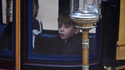 Britain's Prince Louis attends received trainers from Stan Smith, the 1972 Wimbledon men's singles champion. (REUTERS)