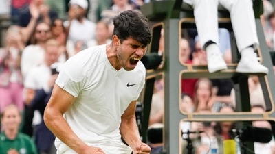 Carlos Alcaraz of Spain reacts after defeating Ugo Humbert of France. (AP) Carlos Alcaraz of Spain reacts after defeating Ugo Humbert of France. (AP)