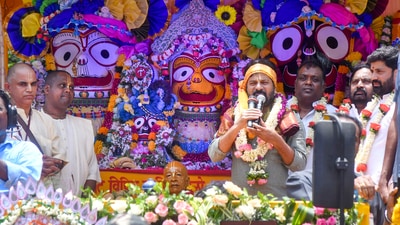 Telangana Chief Minister A Revanth Reddy stands on a chariot carrying idols of Lord Jagannath, his brother Balaram and sister Subhadra during the annual Rath Yatra festival in Hyderabad. (PTI) Telangana Chief Minister A Revanth Reddy stands on a chariot carrying idols of Lord Jagannath, his brother Balaram and sister Subhadra during the annual Rath Yatra festival in Hyderabad. (PTI)